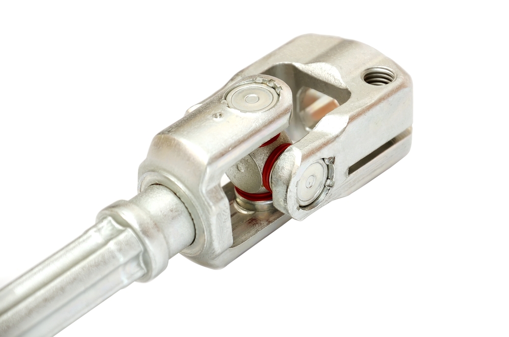Universal joint bearing cups for passenger and commercial vehicles